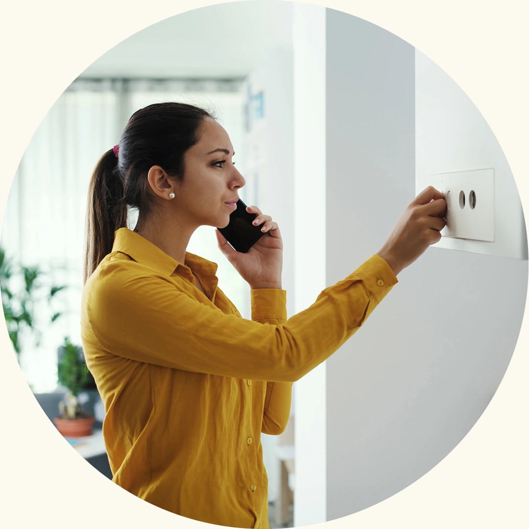 A worried customer looking at their gas boiler