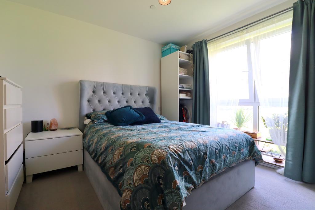 5 Juneberry Apartments - Primary bedroom